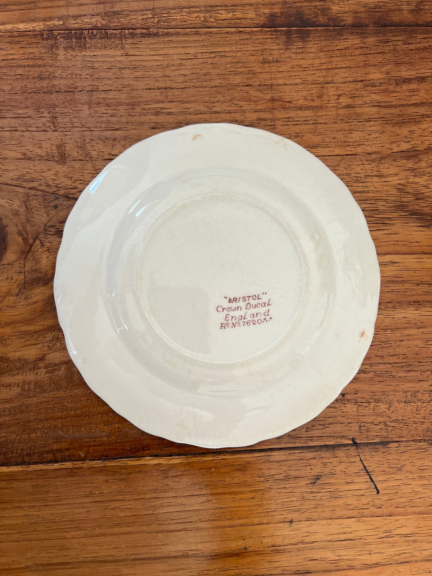 Small brown and white “Bristol” Crown Ducal England plates