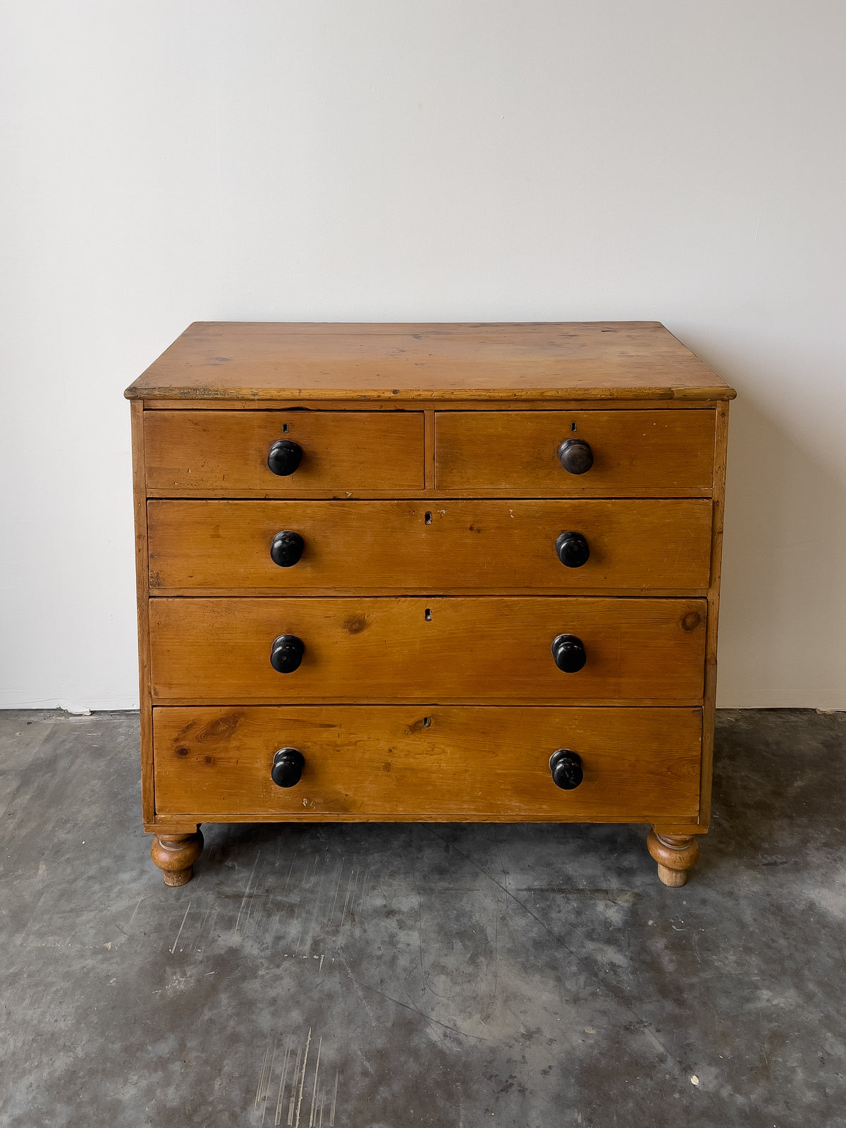 Antique English Pine Rustic Chest of Drawers with Black Knobs