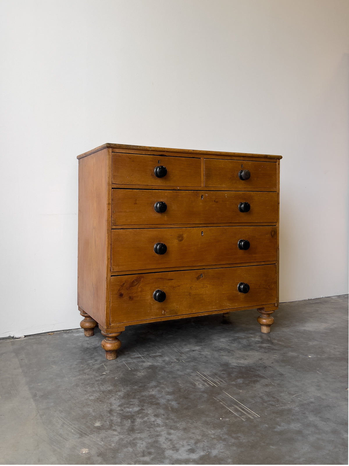 Antique English Pine Rustic Chest of Drawers with Black Knobs