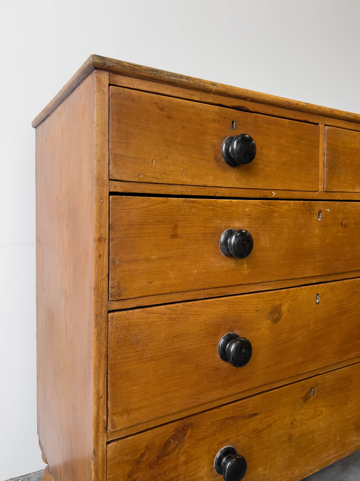 Antique English Pine Rustic Chest of Drawers with Black Knobs