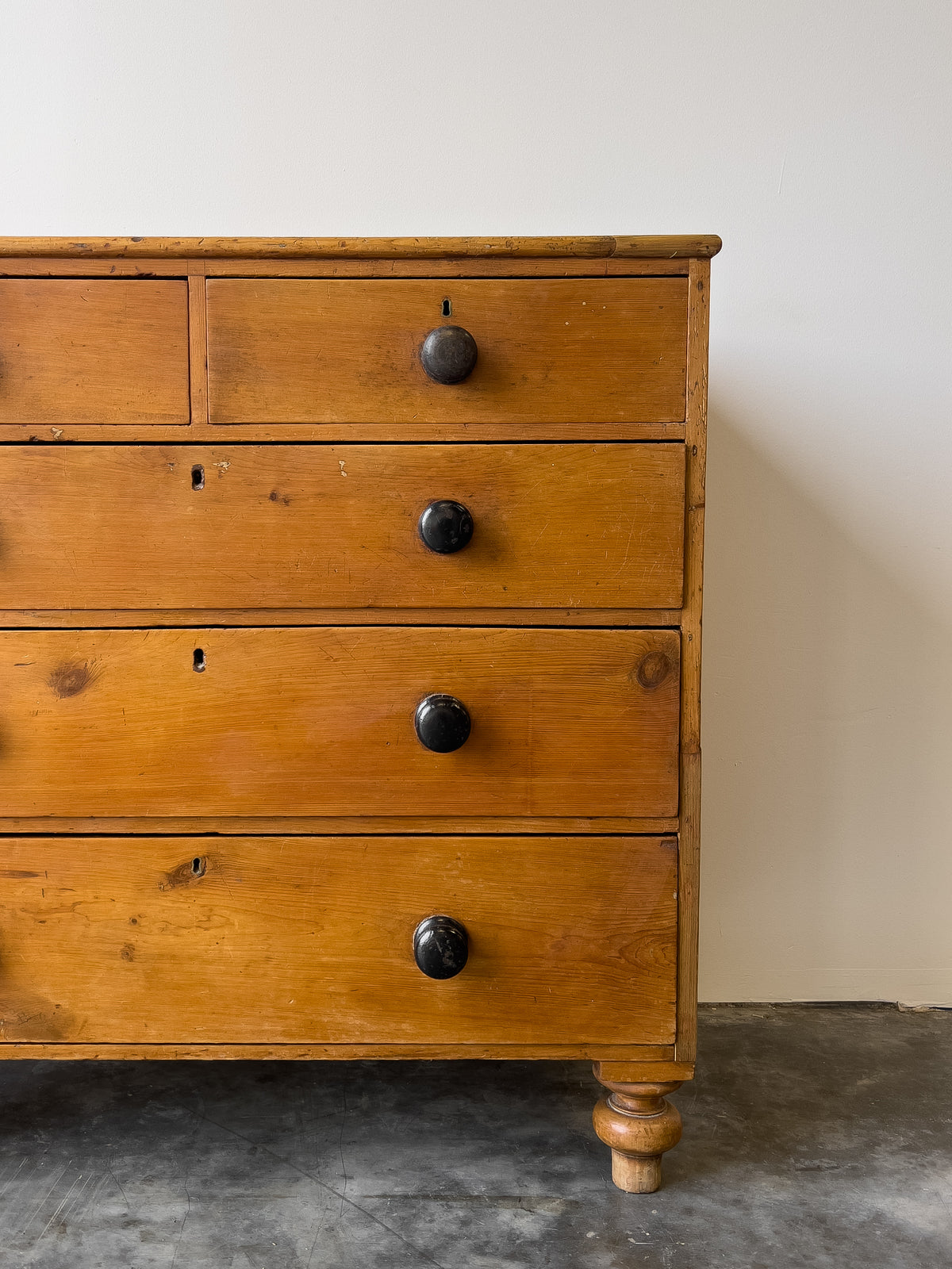 Antique English Pine Rustic Chest of Drawers with Black Knobs