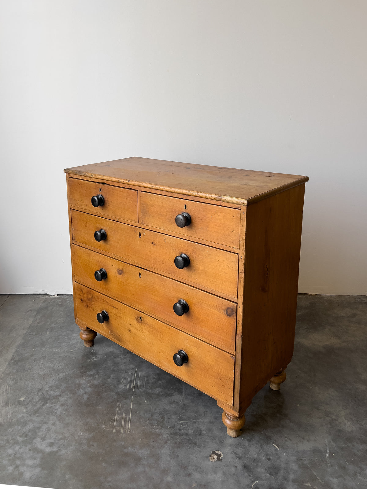 Antique English Pine Rustic Chest of Drawers with Black Knobs