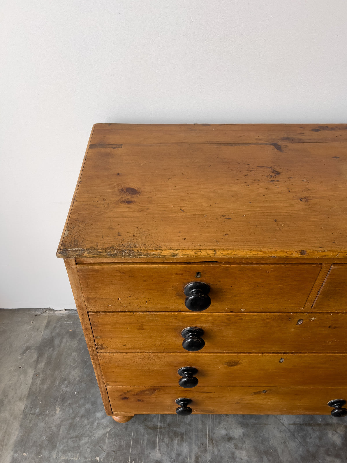 Antique English Pine Rustic Chest of Drawers with Black Knobs