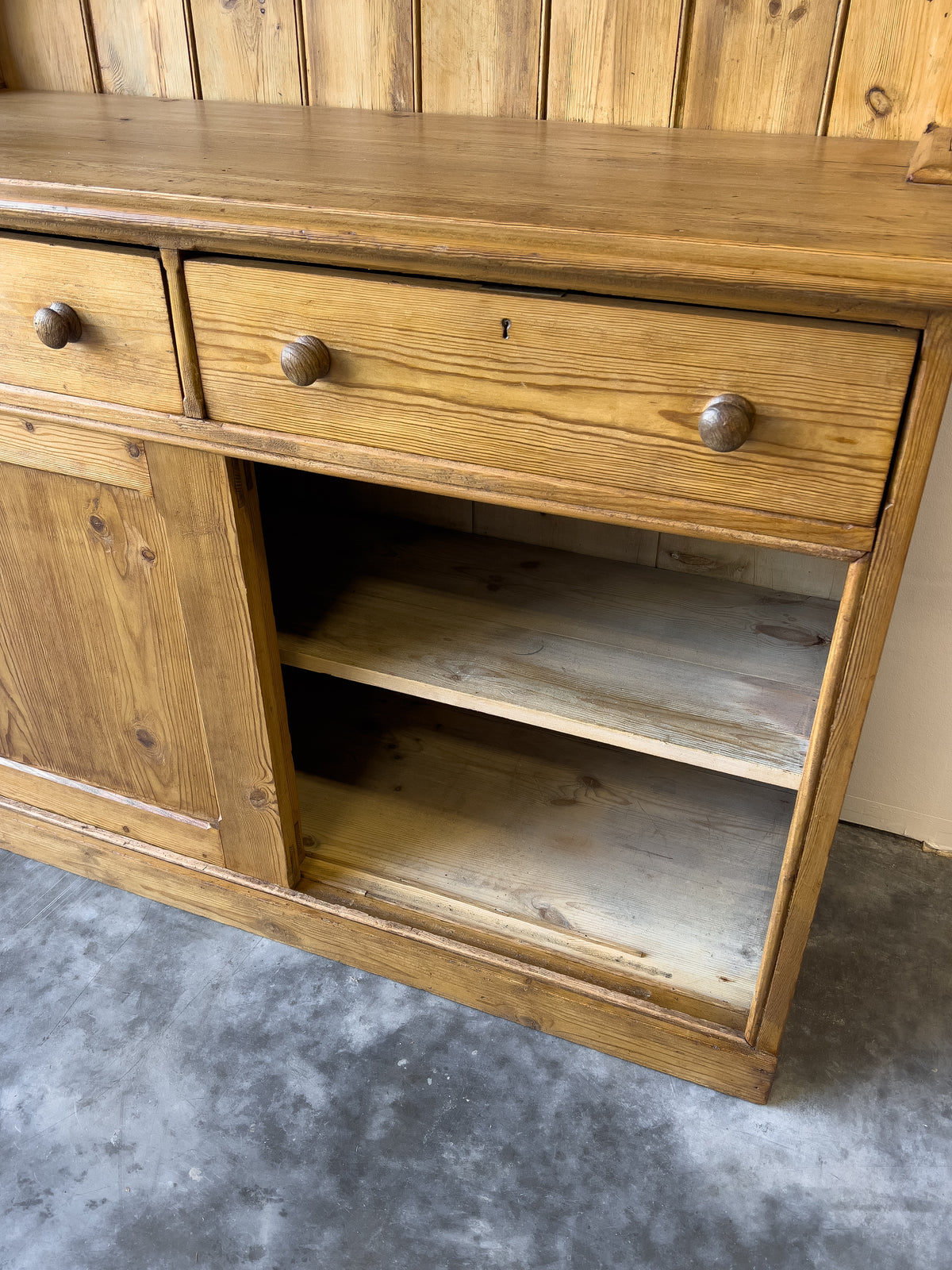 Antique English Pine Dresser with Sliding Door Base
