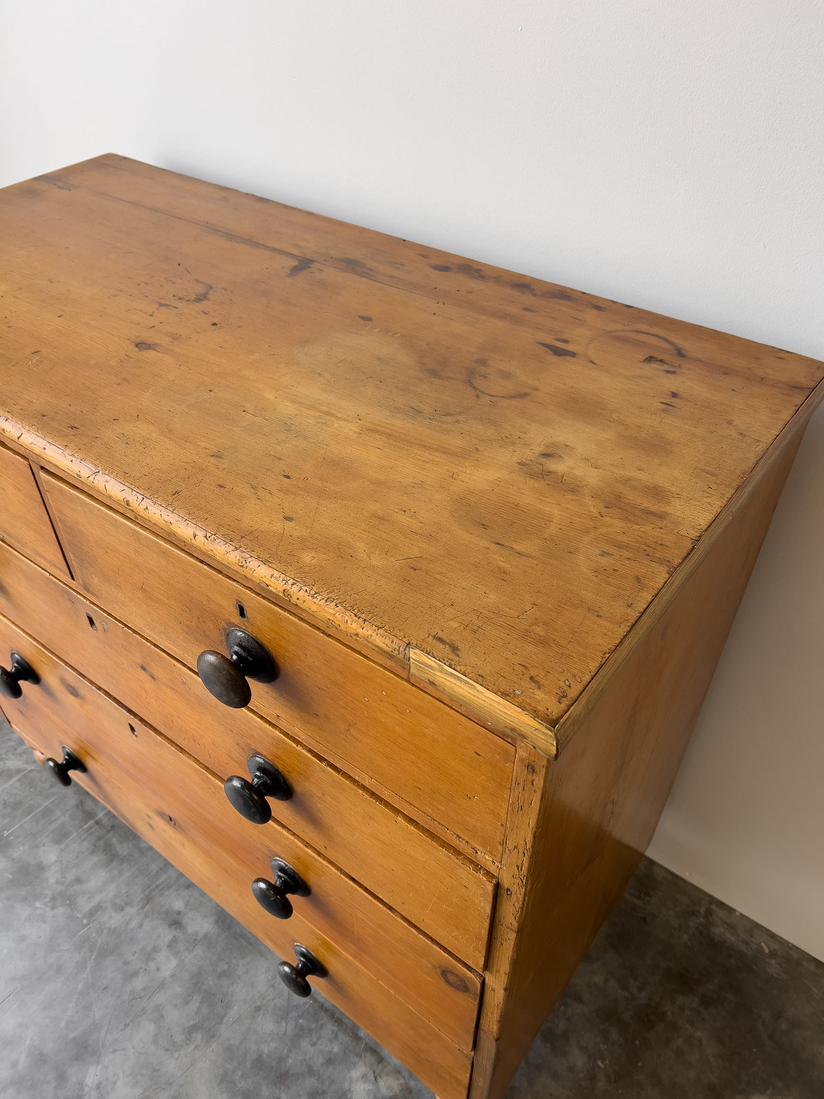 Antique English Pine Rustic Chest of Drawers with Black Knobs